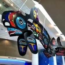 a native american art rendering of an orca whale, hung in the Seattle Children's Hospital Lobby